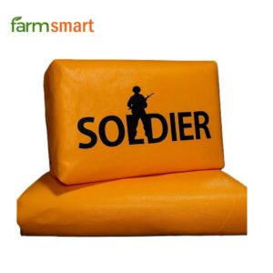 Farmer using FarmSmart Power Sprayer during monsoon season to protect crops.