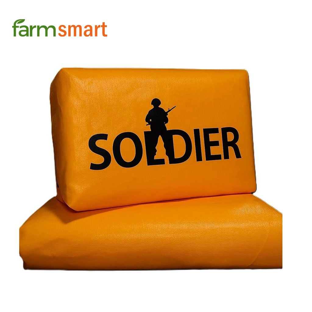 Farmer using FarmSmart Power Sprayer during monsoon season to protect crops.